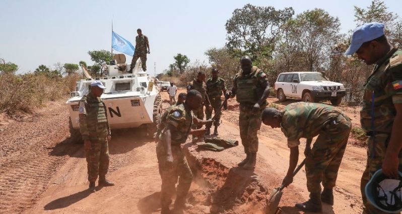 United Nations troops inspecting a road